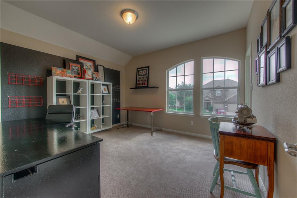 1511 Rimstone Drive Cedar Park, TX 78613 - Photo 25 of 40 a room with furniture and a window