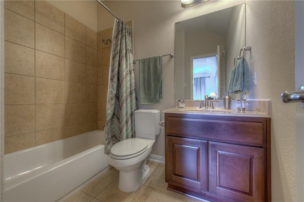 1511 Rimstone Drive Cedar Park, TX 78613 - Photo 29 of 40 a bathroom with a sink toilet and shower