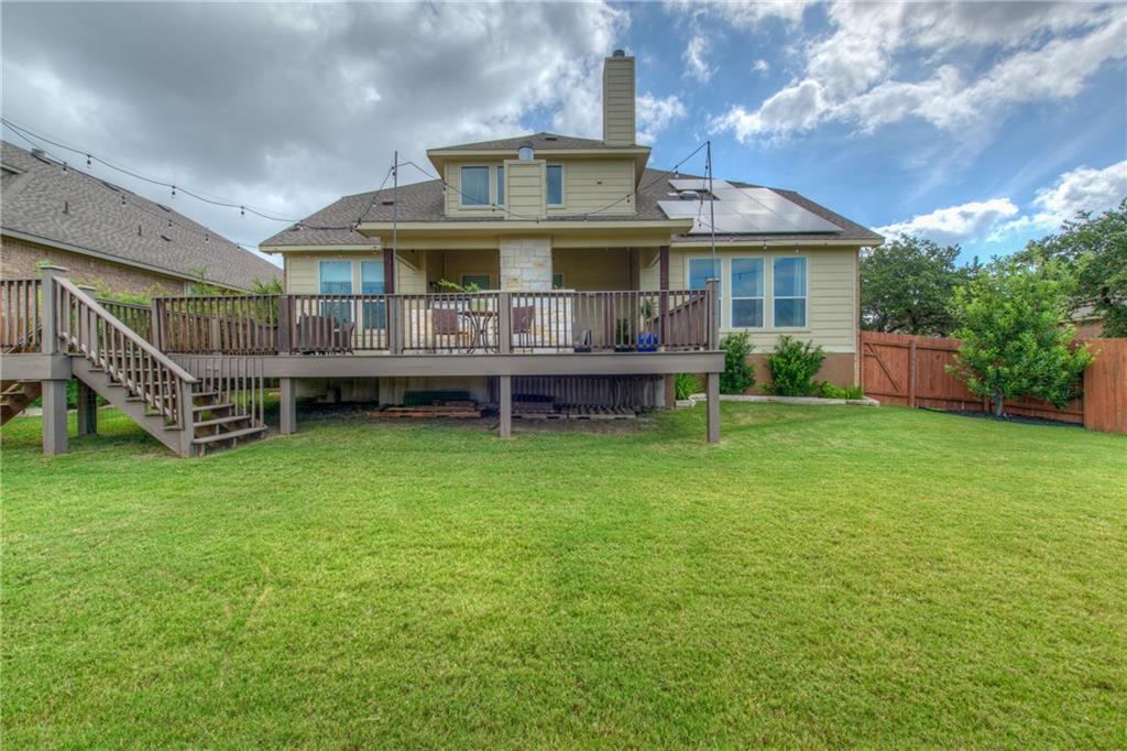 1511 Rimstone Drive Cedar Park, TX 78613 - Photo 34 of 40 a front view of a house with a garden and deck