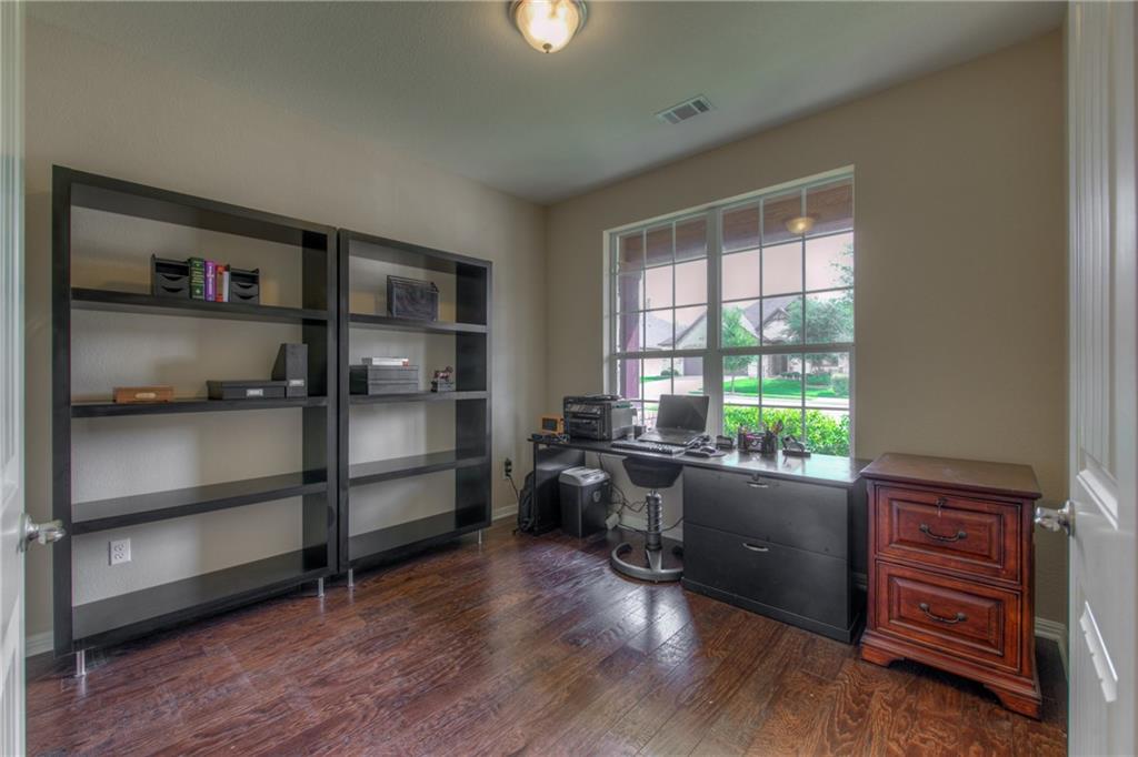 1511 Rimstone Drive Cedar Park, TX 78613 - Photo 5 of 40 a room with furniture wooden floor and window