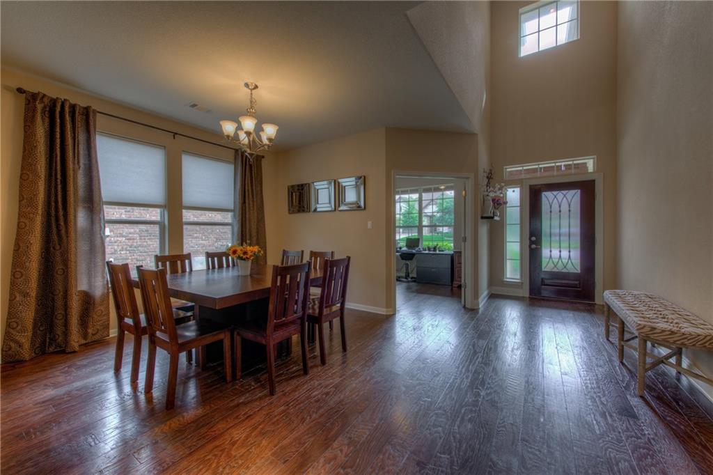 1511 Rimstone Drive Cedar Park, TX 78613 - Photo 7 of 40 a view of a dining room with furniture and window