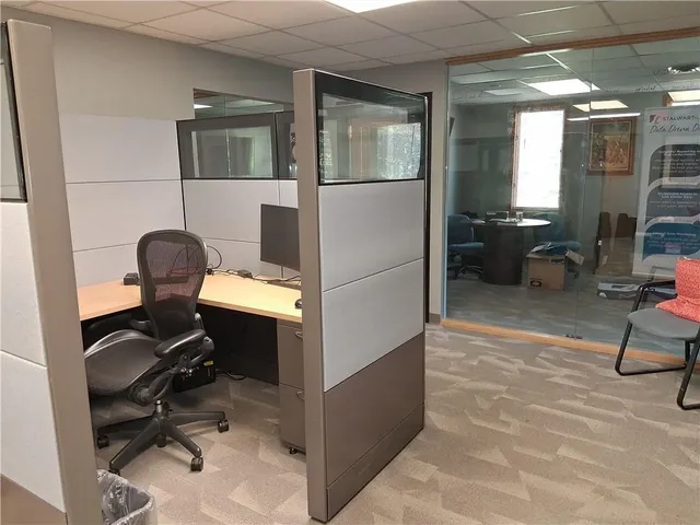 a workspace with furniture and natural light