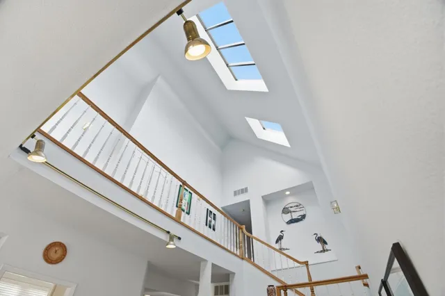 a view of a hallway with windows