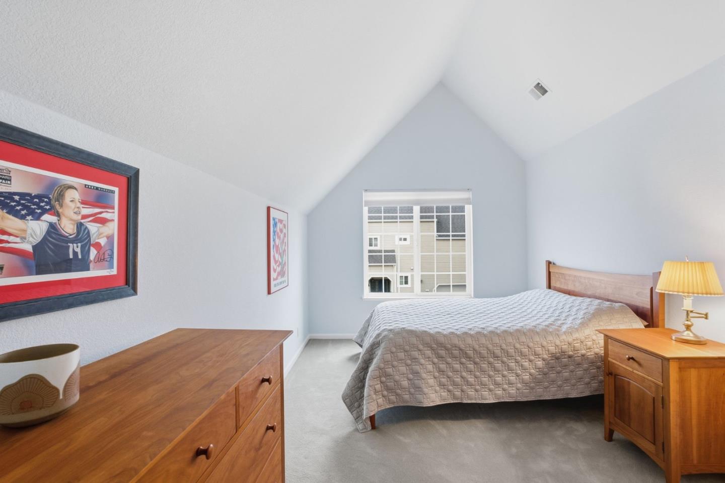 25 Merion Road Half Moon Bay, CA 94019 - Photo 51 of 72 a bedroom with a bed and wooden floor