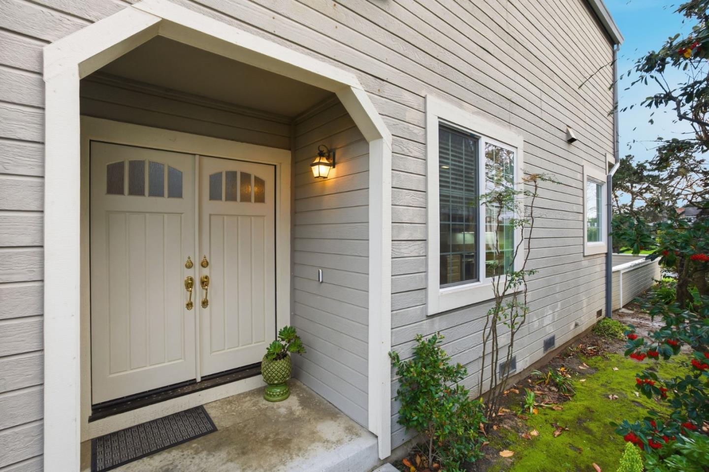 25 Merion Road Half Moon Bay, CA 94019 - Photo 7 of 72 a front view of a house with a garden