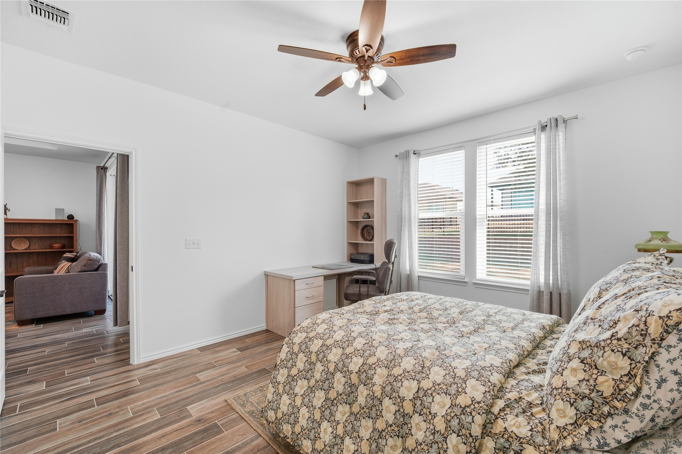 122 Clay Hl Street Georgetown, TX 78633 - Photo 15 of 31 Bedroom with wood tiled floors and a ceiling fan