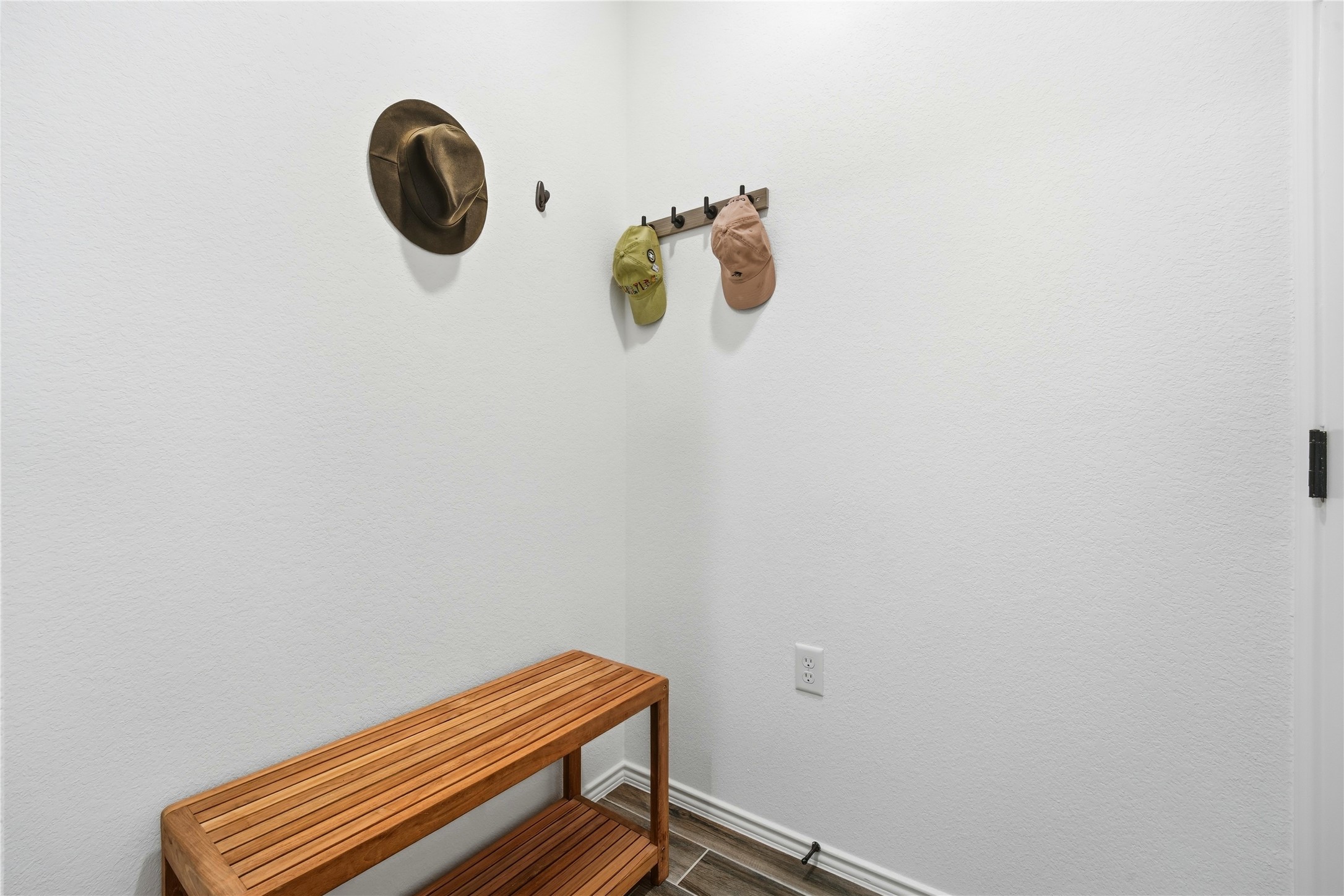 122 Clay Hl Street Georgetown, TX 78633 - Photo 21 of 31 Detailed view of baseboards and wood finished floors