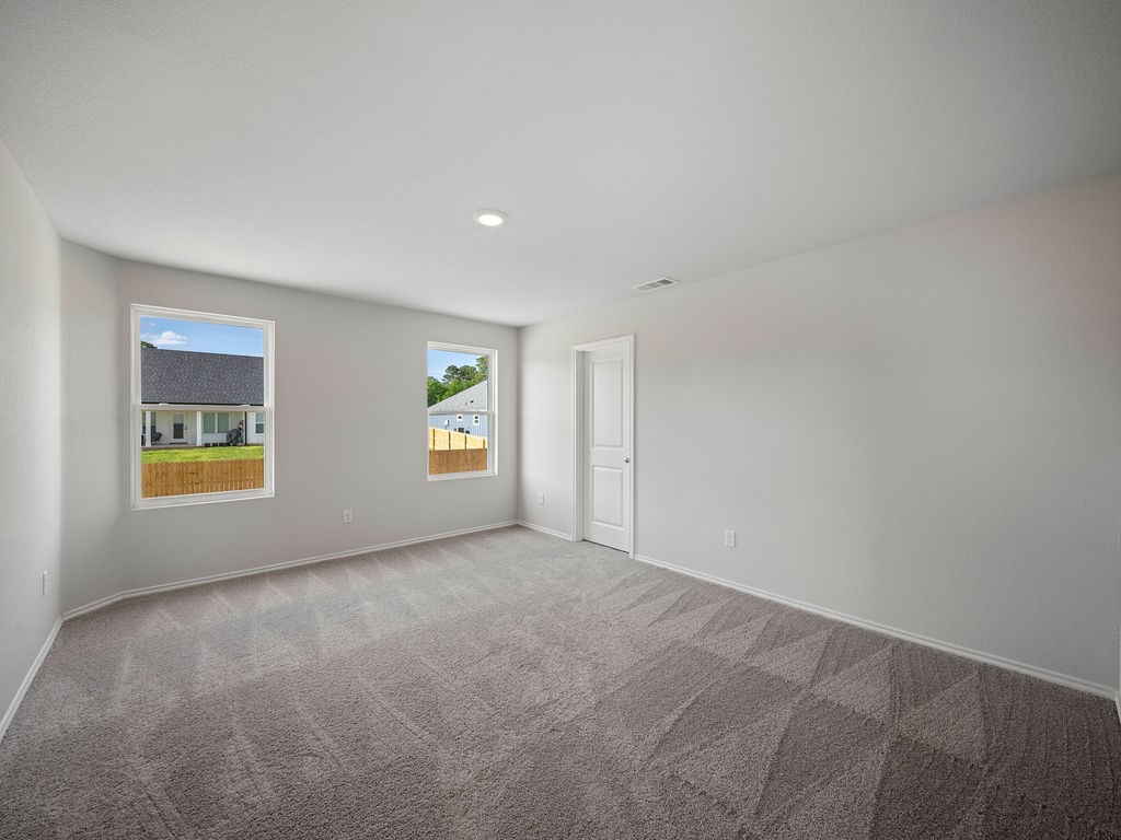 218 Stoney Ridge Lufkin, TX 75904 - Photo 14 of 29 an empty room with windows