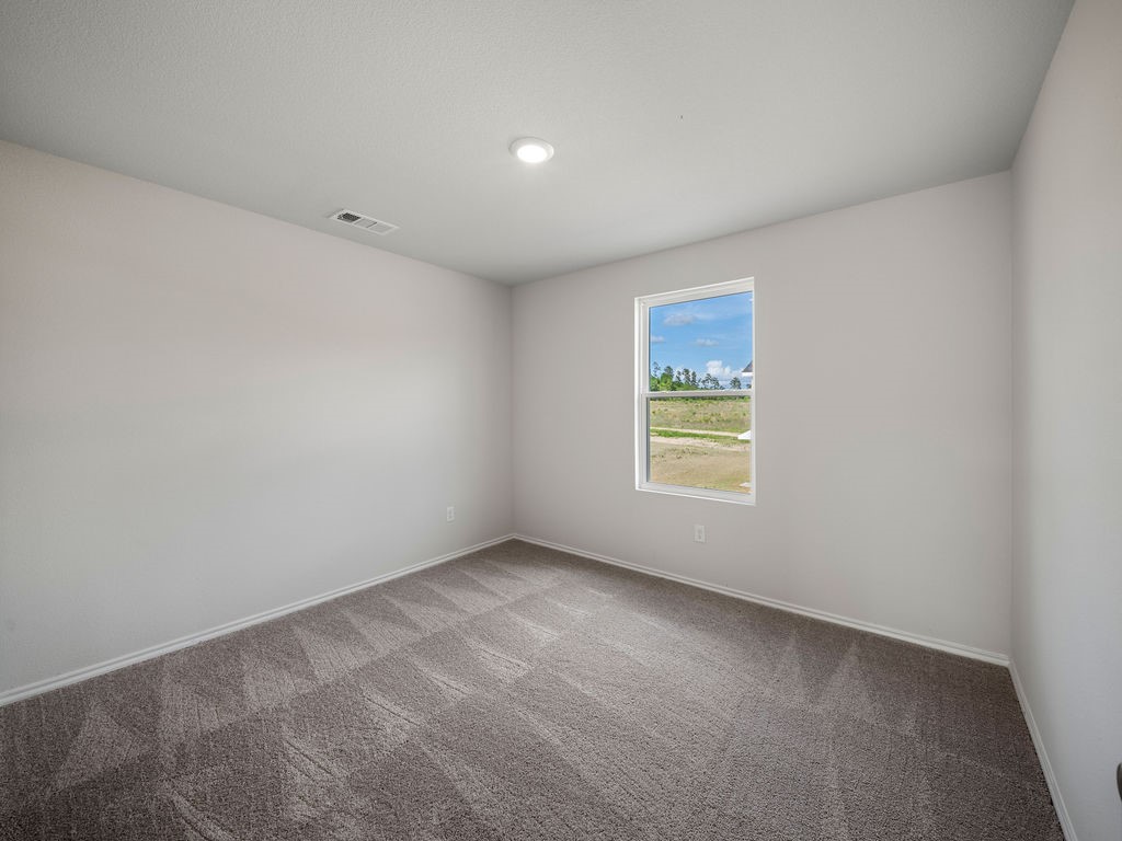 218 Stoney Ridge Lufkin, TX 75904 - Photo 19 of 29 an empty room with a window
