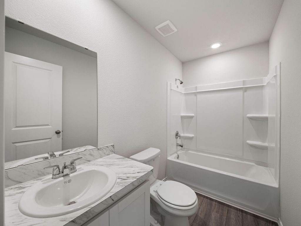218 Stoney Ridge Lufkin, TX 75904 - Photo 22 of 29 a bathroom with a sink toilet and shower