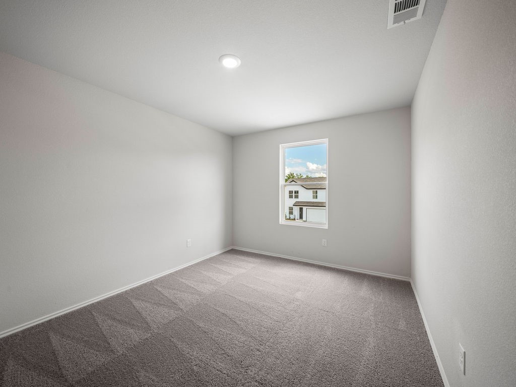 218 Stoney Ridge Lufkin, TX 75904 - Photo 26 of 29 an empty room with windows