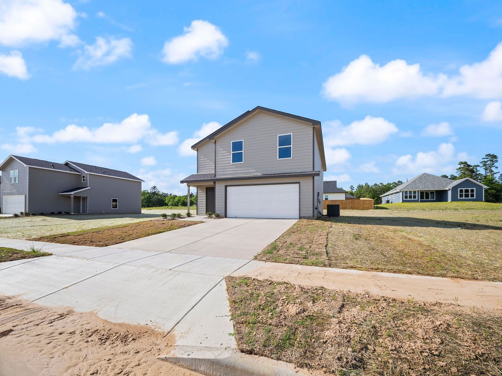 218 Stoney Ridge Lufkin, TX 75904 - Photo 3 of 29 a house view with a outdoor space