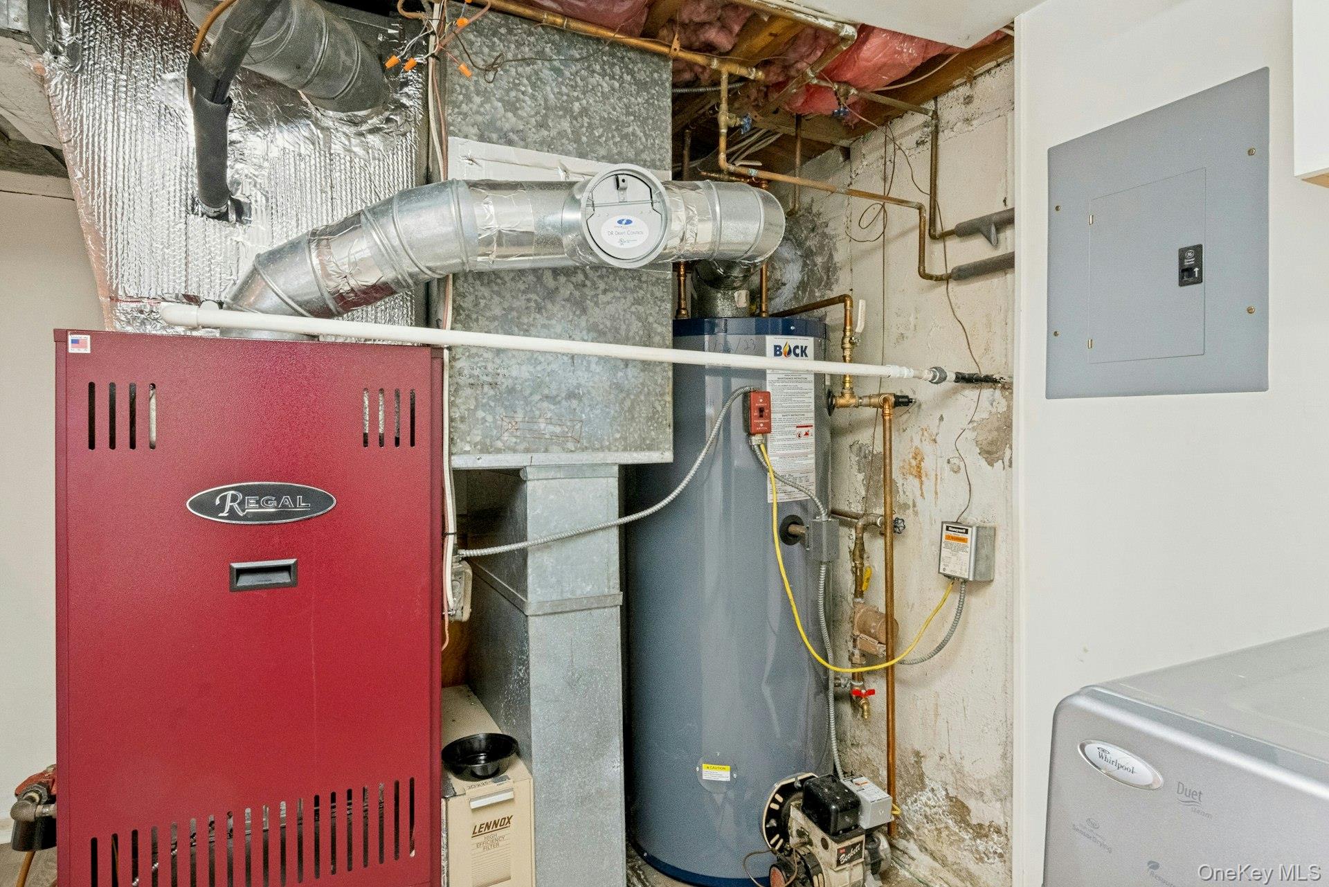 82 Holbrooke Road White Plains, NY 10605 - Photo 26 of 33 Newer Oil Boiler and hot water heater.