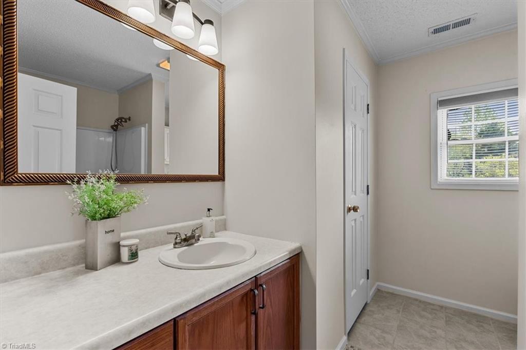 9825 Cherry Grove Road Reidsville, NC 27320 - Photo 28 of 49 HALL BATHROOM WITH LINEN CLOSET!