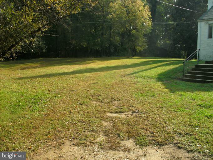 9612 Livingston Road Fort Washington, MD 20744 - Photo 1 of 13 a view of a tennis court