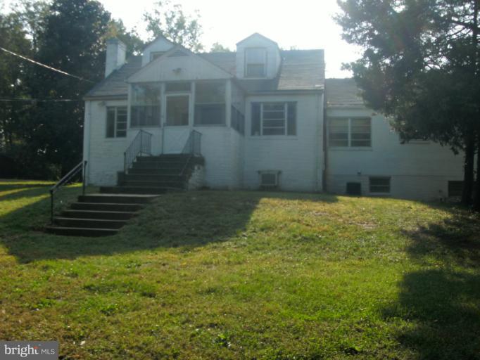 9612 Livingston Road Fort Washington, MD 20744 - Photo 2 of 13 a view of a house with a yard