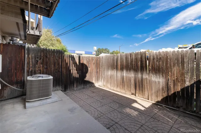 a view of a backyard with pathway