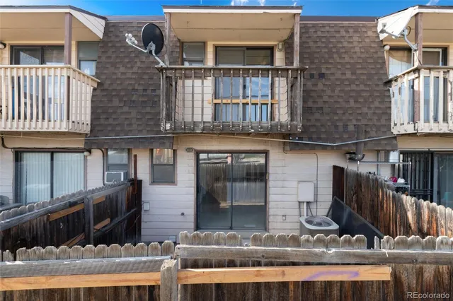a front view of a house with glass windows