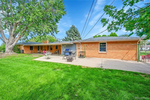 front view of a house with a patio