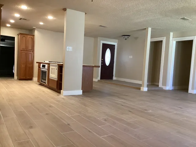 a view of a kitchen with a sink