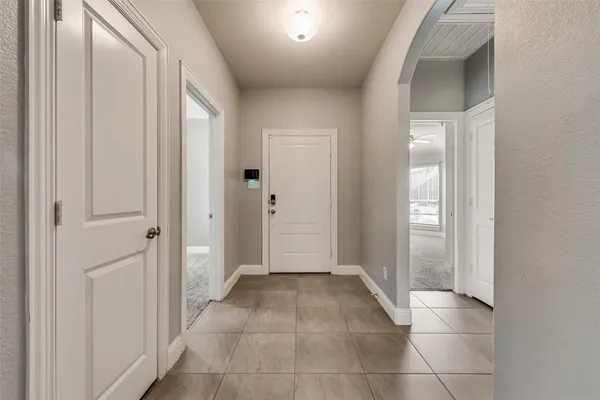 a view of a hallway with natural light