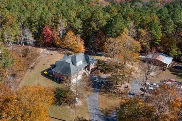 an aerial view of residential house with outdoor space