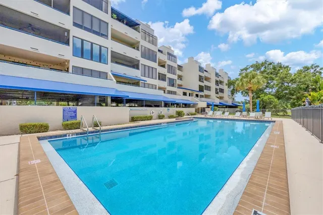 a view of a lake with wooden stairs