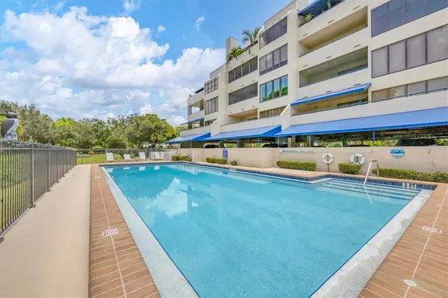 a view of a lake with a yard