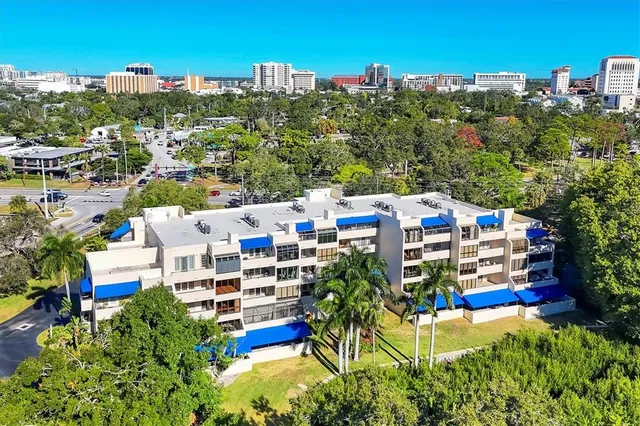 a view of a lake with a building in the background