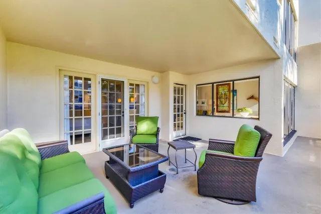 a living room with furniture and a rug