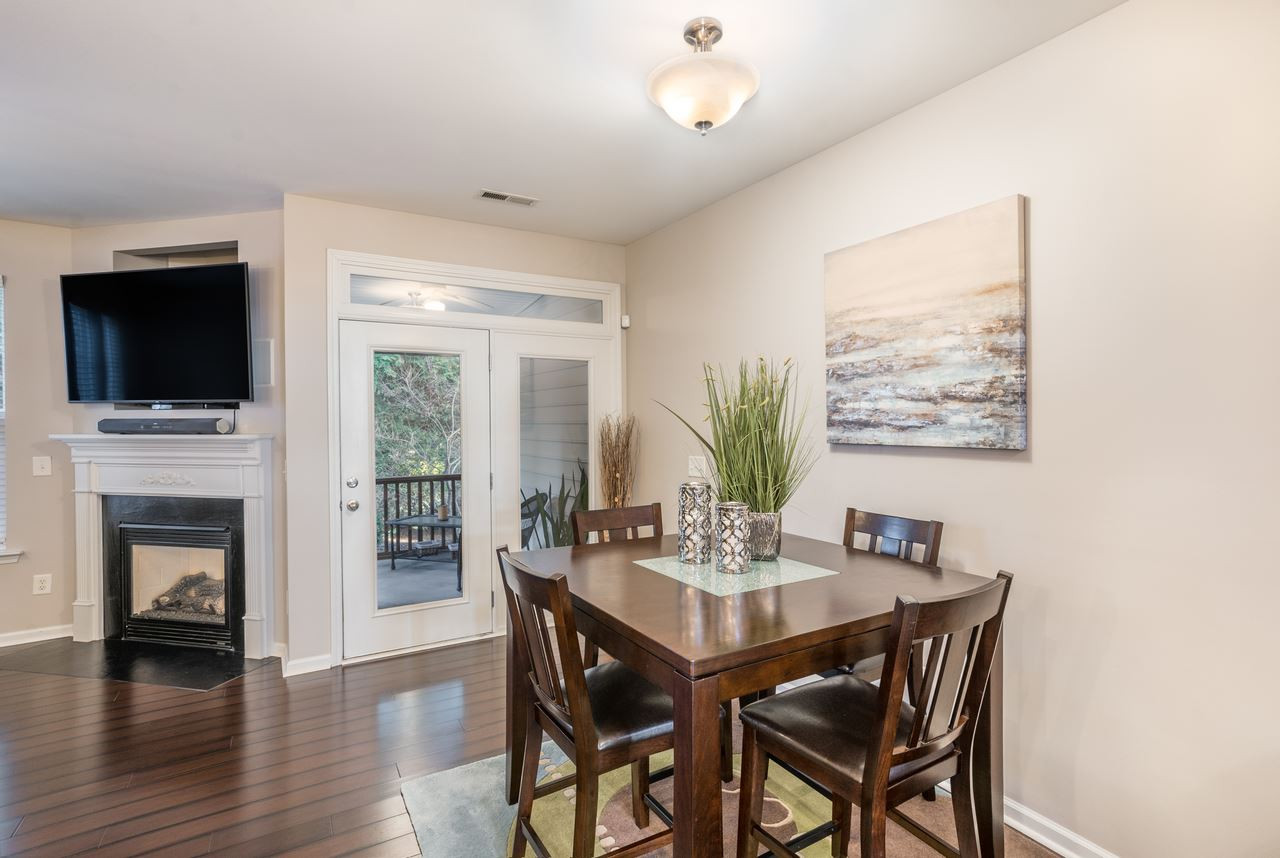 4925 Amber Clay Lane Raleigh, NC 27612 - Photo 6 of 11 Sit at the kitchen counter seating area or enjoy your dining room. Lots of space for entertaining friends or a quiet family dinner. Dining Area