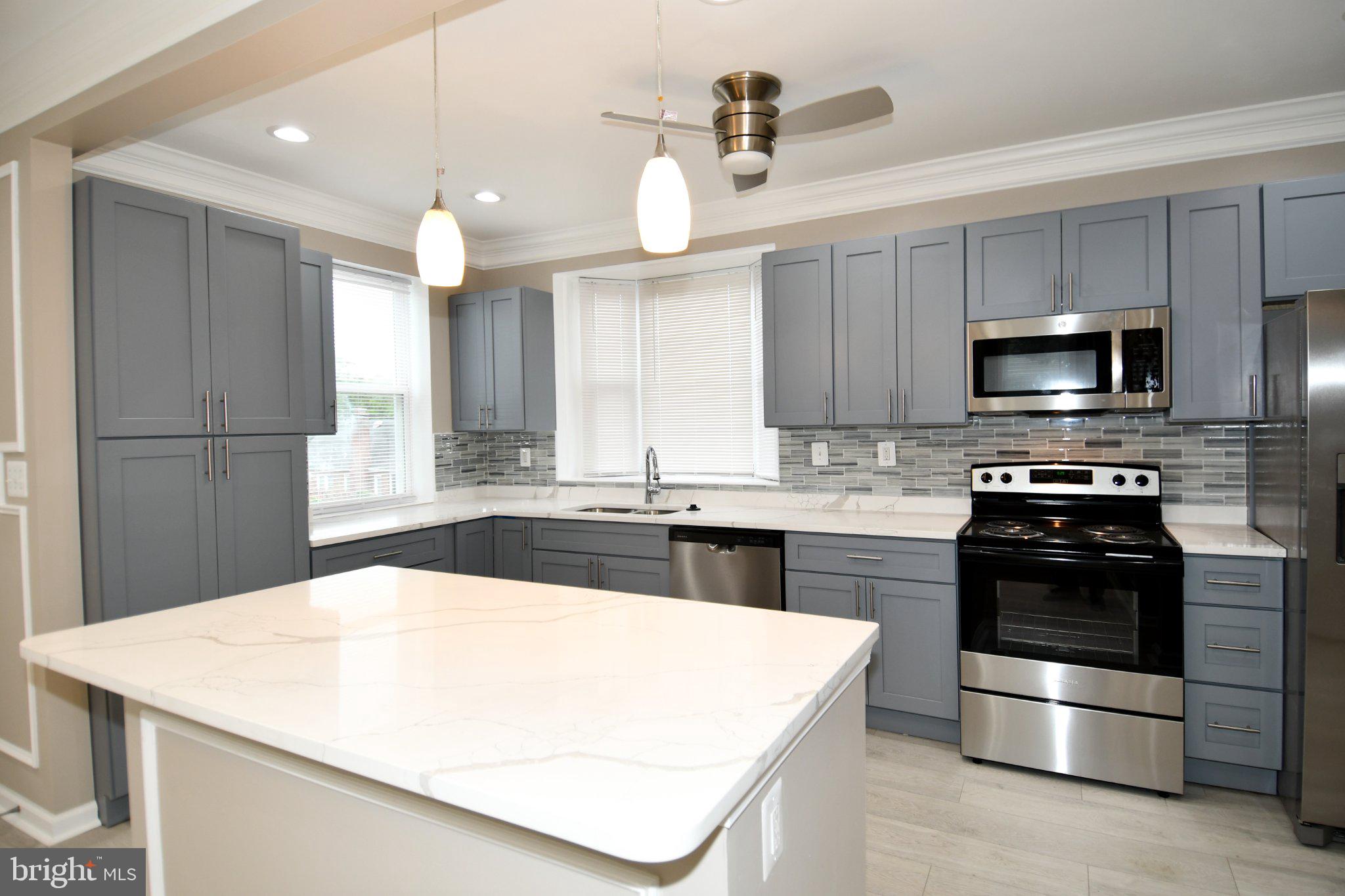 5301 Tilden Road Bladensburg, MD 20710 - Photo 11 of 45 Modern kitchen with sleek finishes.