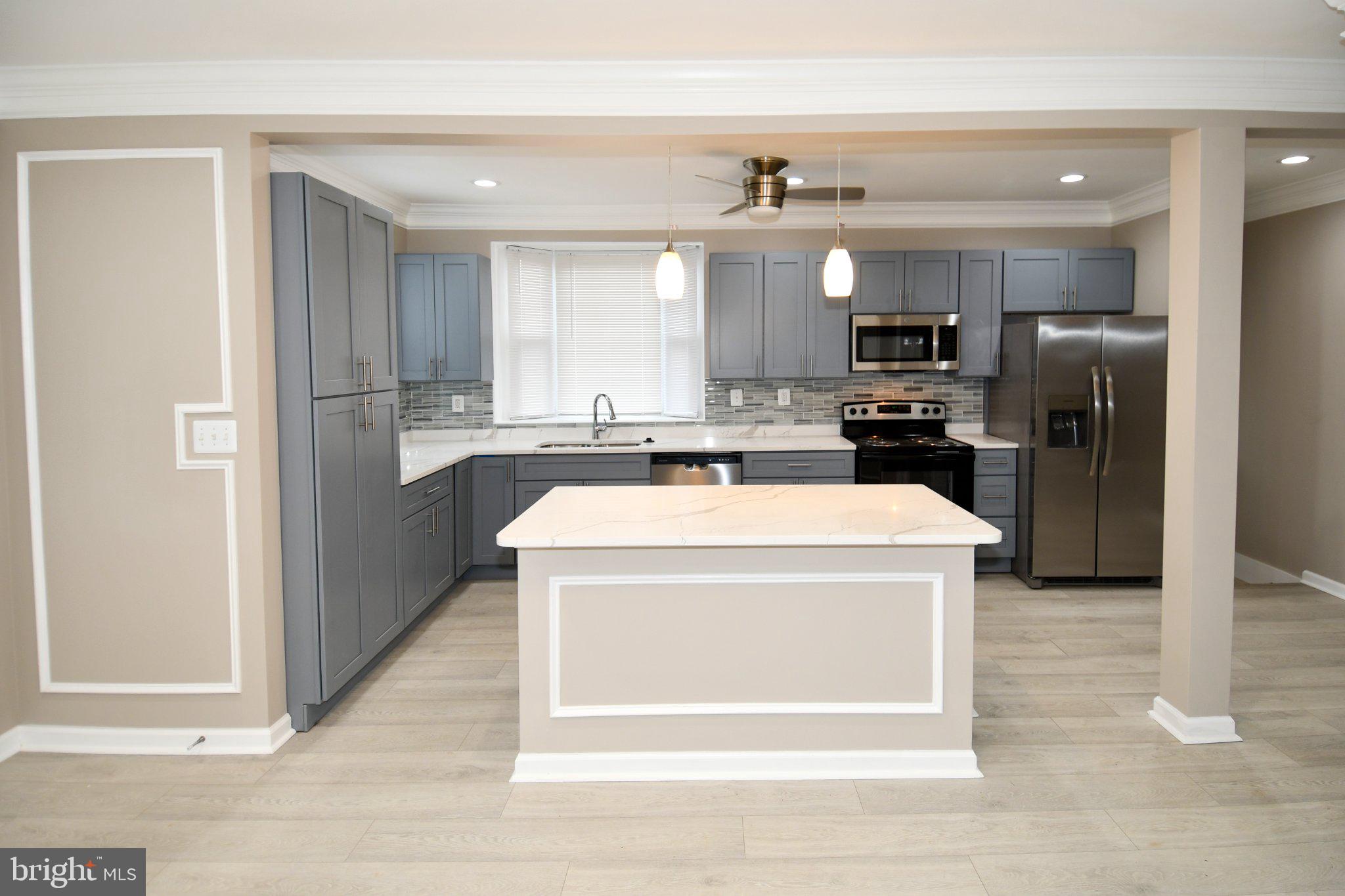 5301 Tilden Road Bladensburg, MD 20710 - Photo 12 of 45 Modern kitchen with sleek finishes.