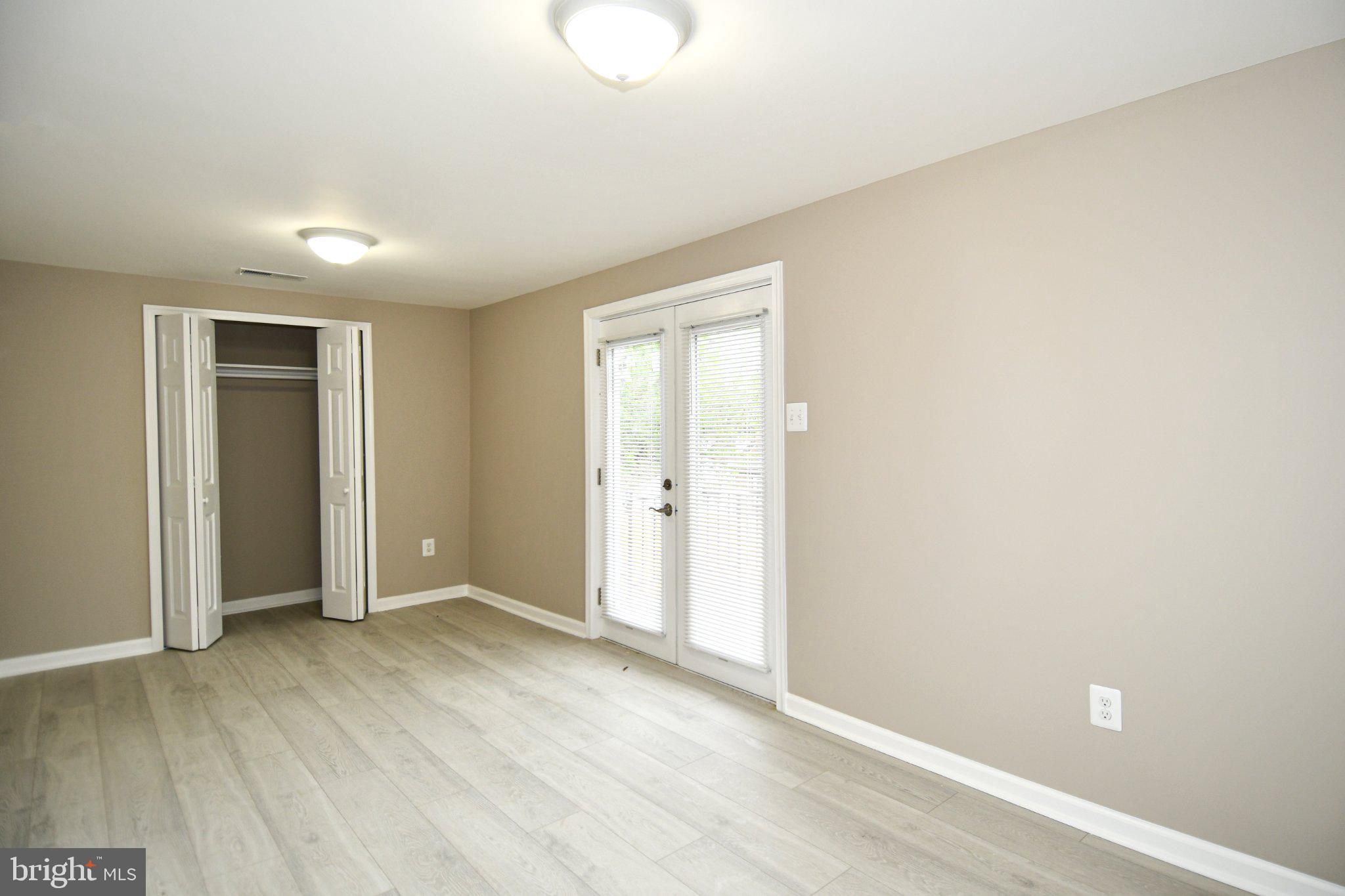 5301 Tilden Road Bladensburg, MD 20710 - Photo 15 of 45 Bright and airy room with dual doors.