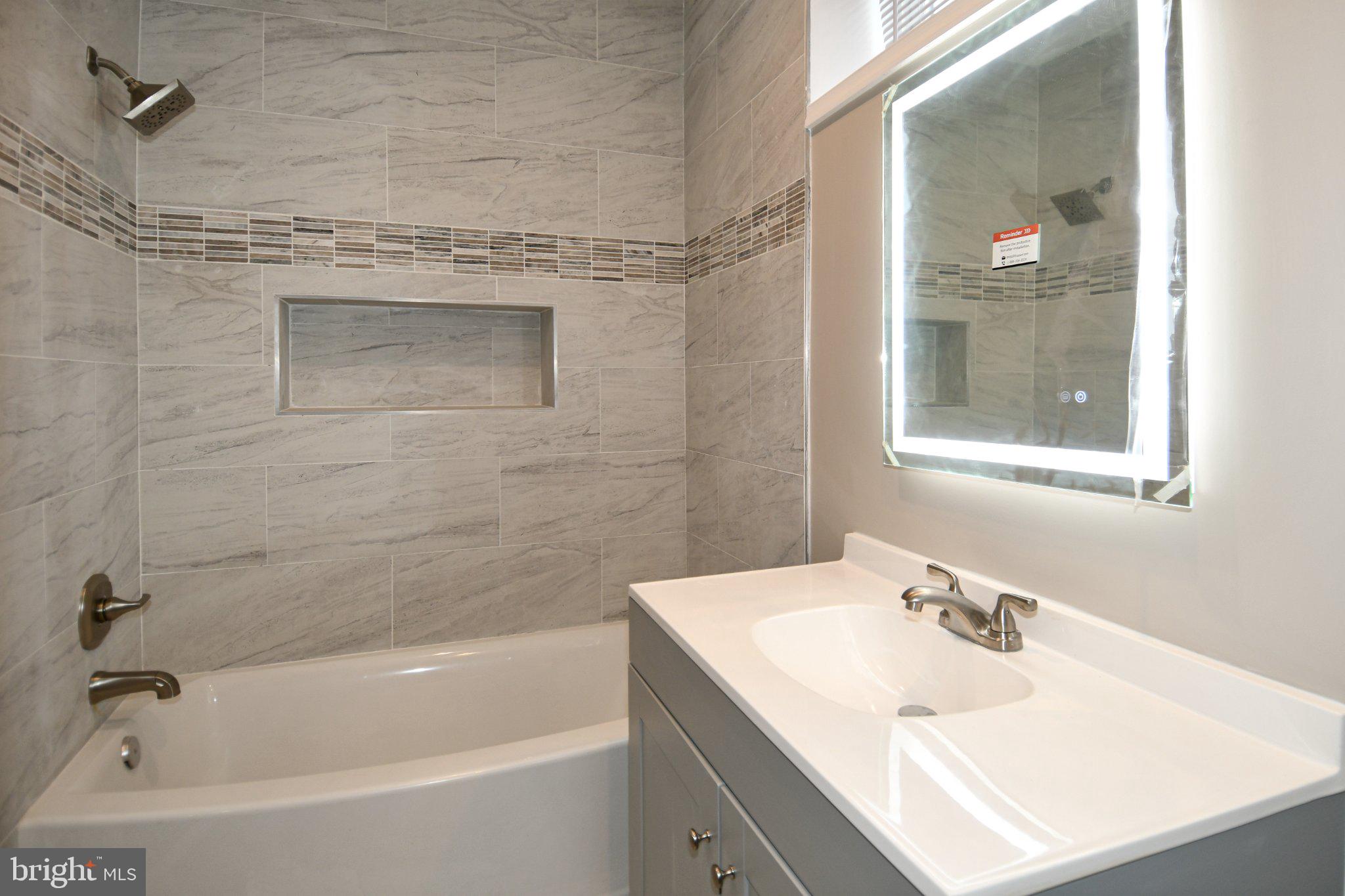 5301 Tilden Road Bladensburg, MD 20710 - Photo 25 of 45 Modern bathroom with sleek finishes.