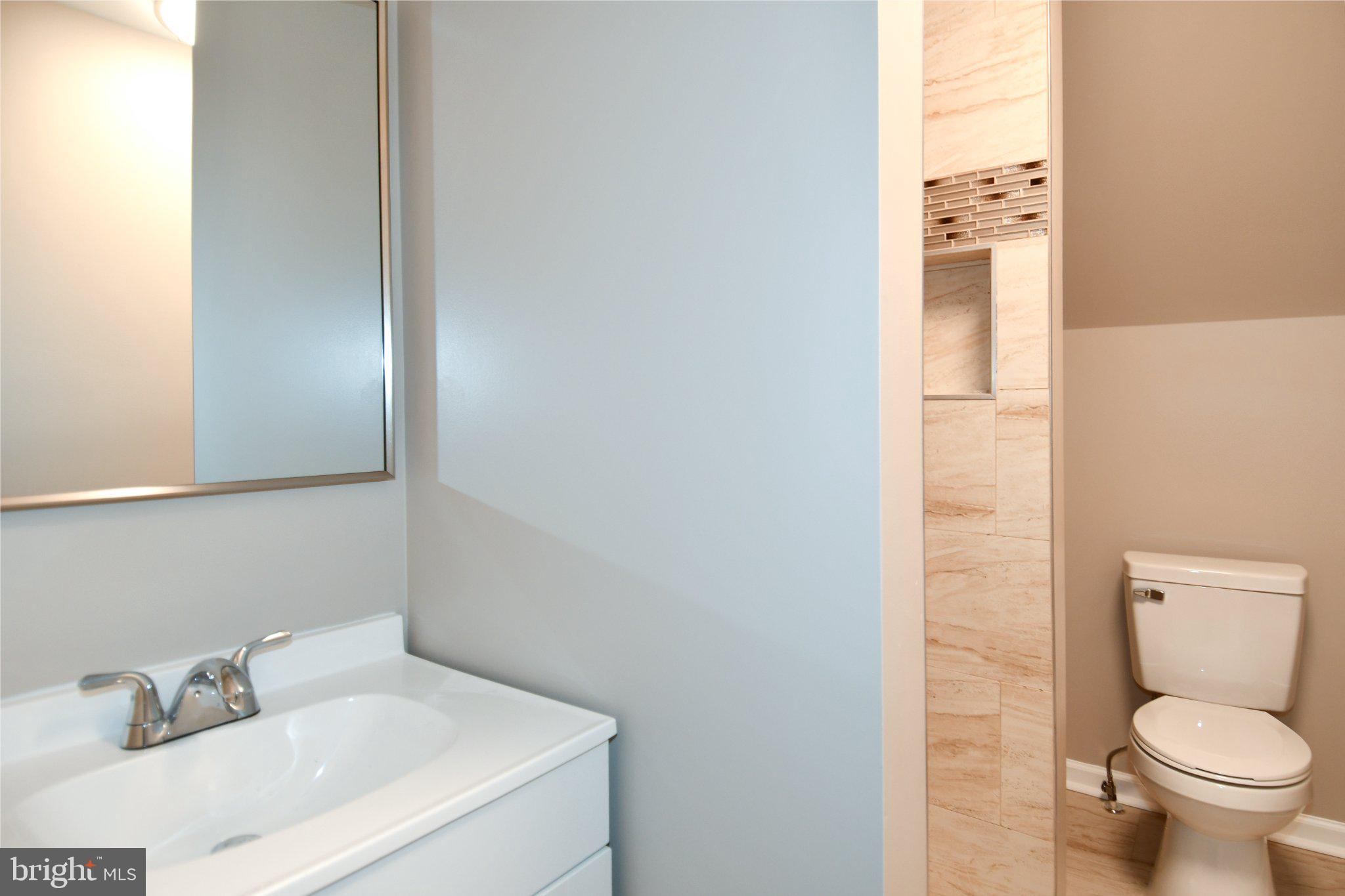 5301 Tilden Road Bladensburg, MD 20710 - Photo 26 of 45 Modern bathroom with sleek finishes.