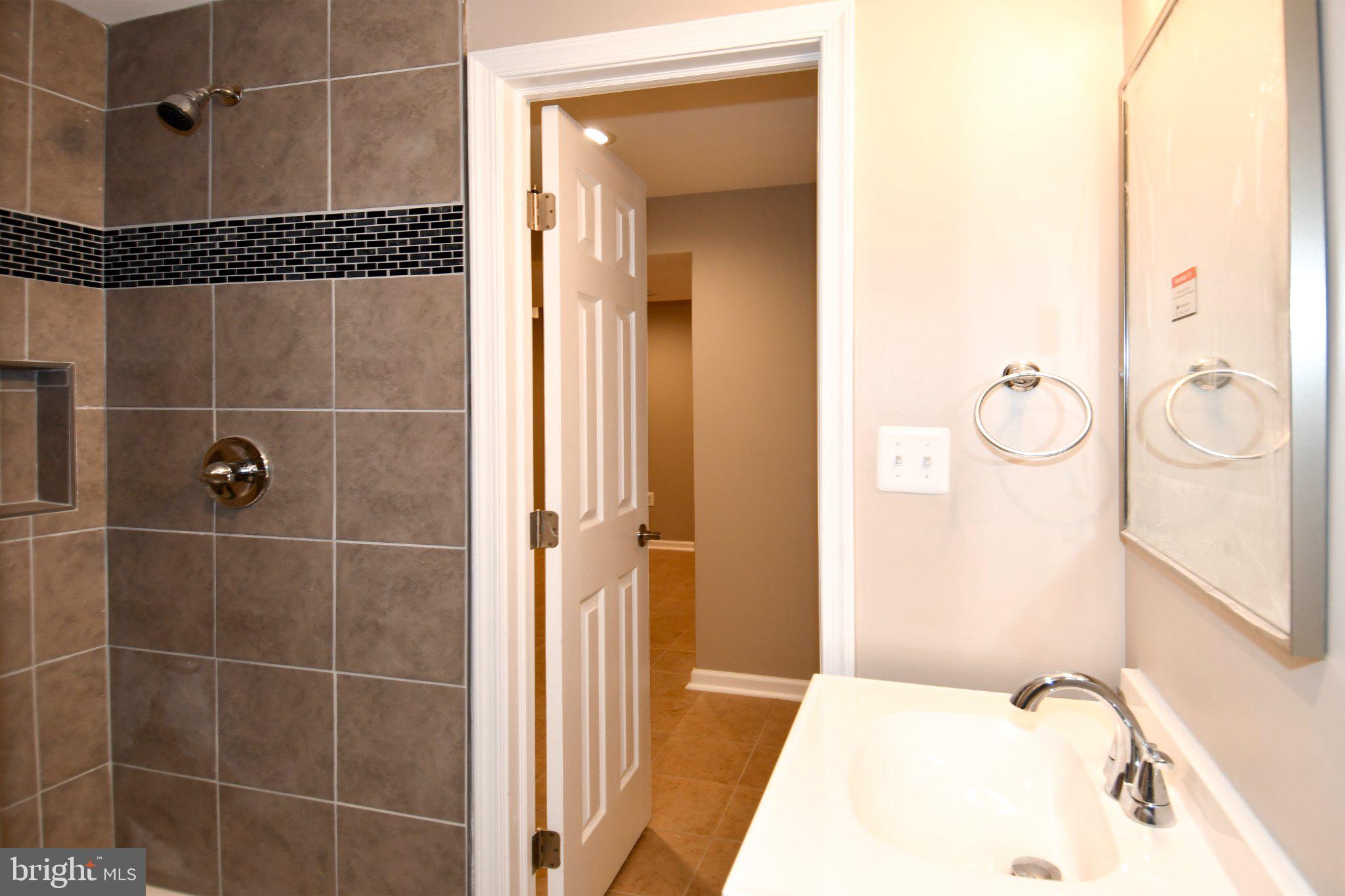 5301 Tilden Road Bladensburg, MD 20710 - Photo 27 of 45 Modern bathroom with sleek finishes.