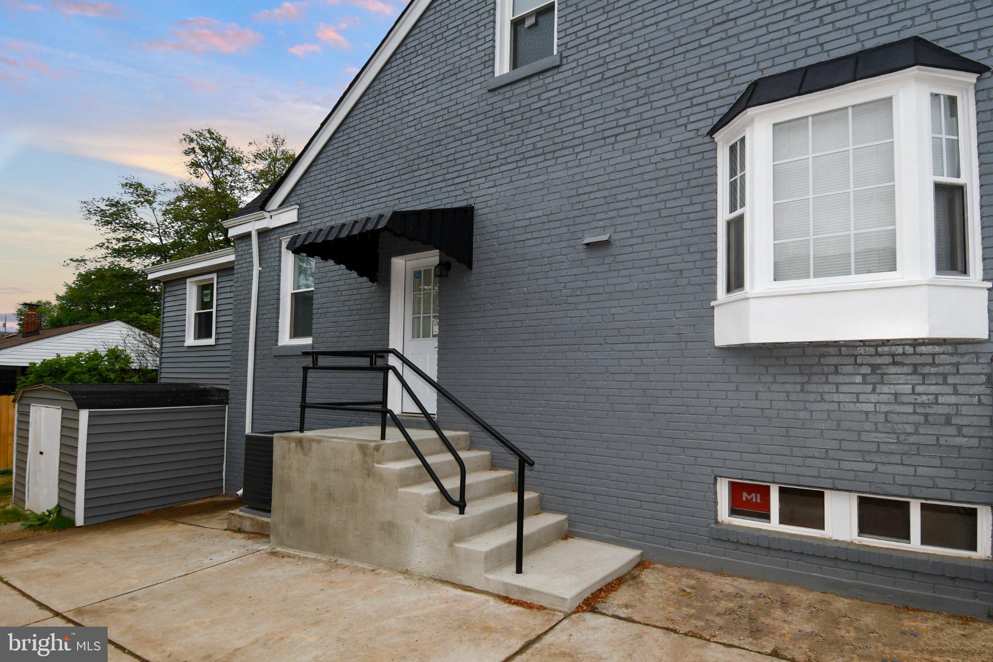 5301 Tilden Road Bladensburg, MD 20710 - Photo 3 of 45 Charming gray facade with modern accents.