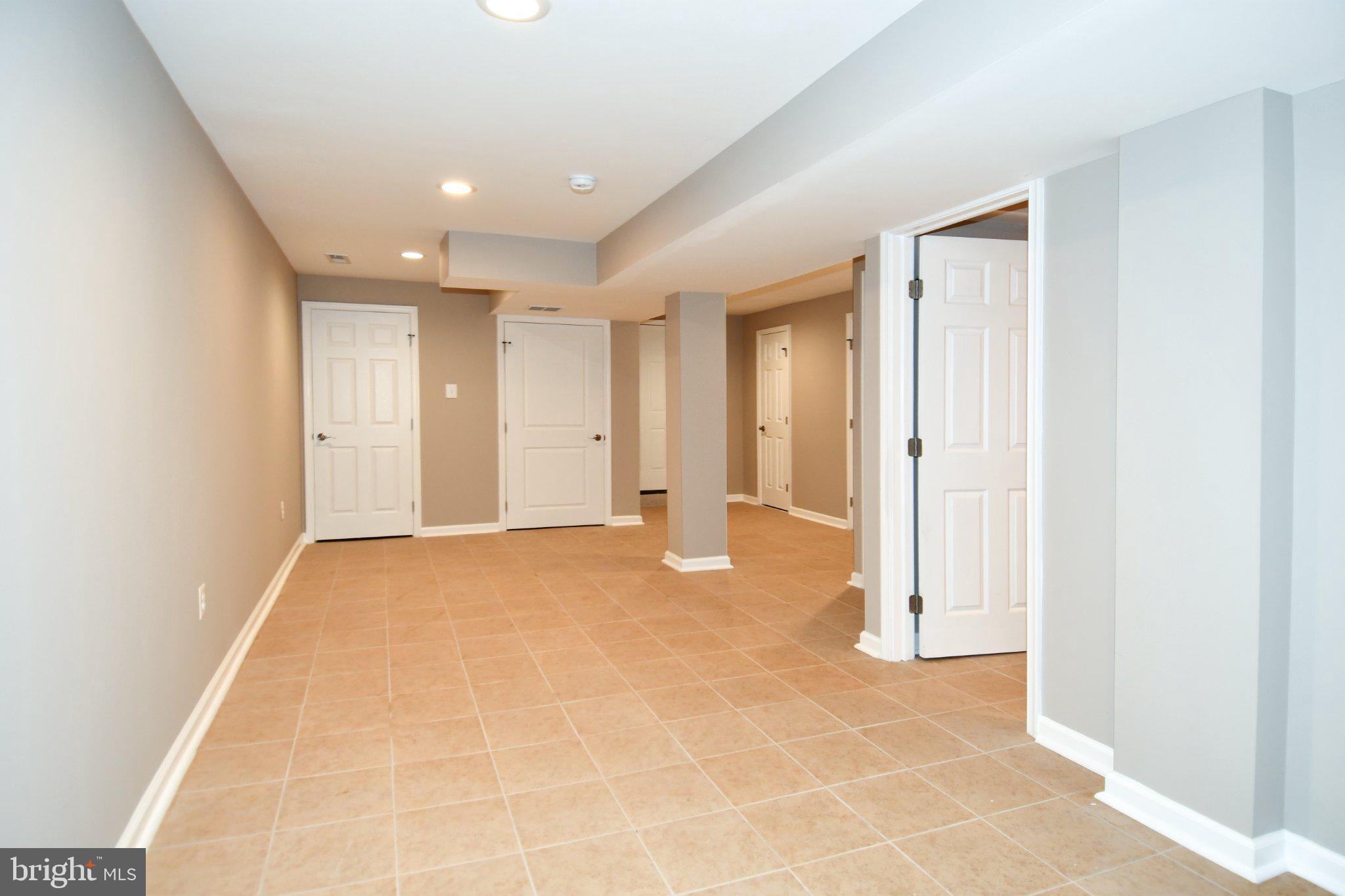 5301 Tilden Road Bladensburg, MD 20710 - Photo 35 of 45 Spacious, versatile basement retreat.
