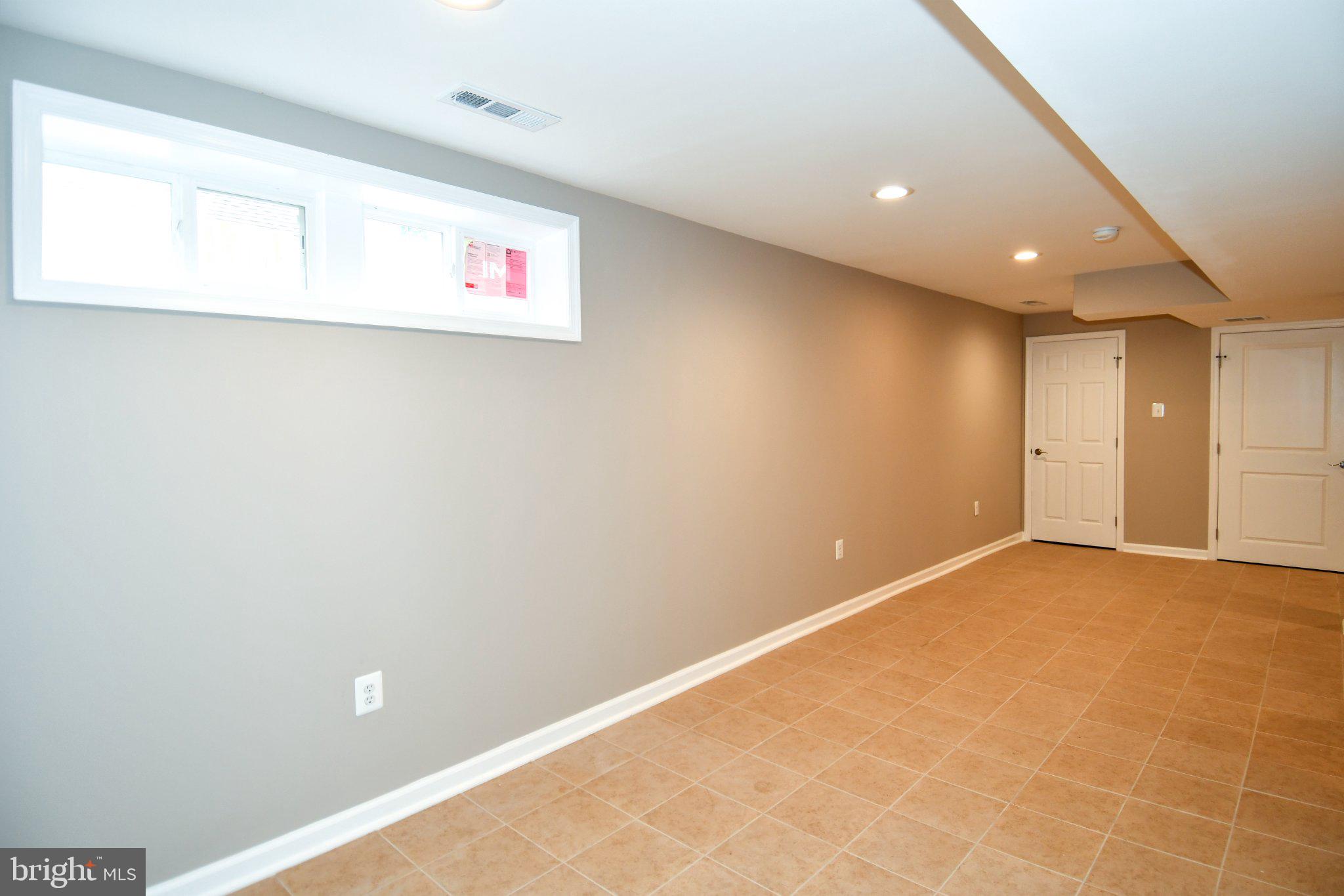 5301 Tilden Road Bladensburg, MD 20710 - Photo 36 of 45 Versatile basement space awaits your vision.