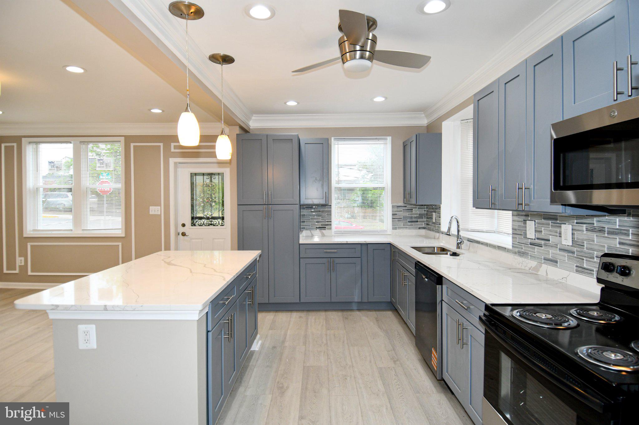 5301 Tilden Road Bladensburg, MD 20710 - Photo 10 of 45 Modern kitchen with sleek finishes.