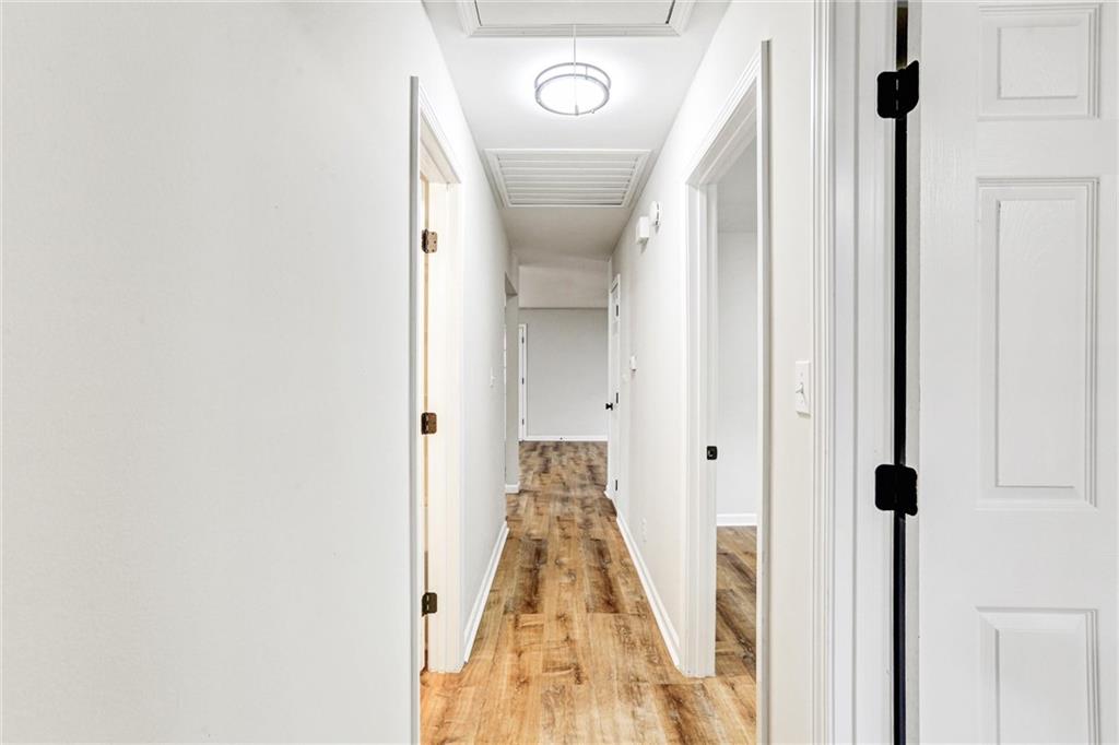 122 Capitol Avenue Winder, GA 30680 - Photo 14 of 34 a view of a hallway with a door