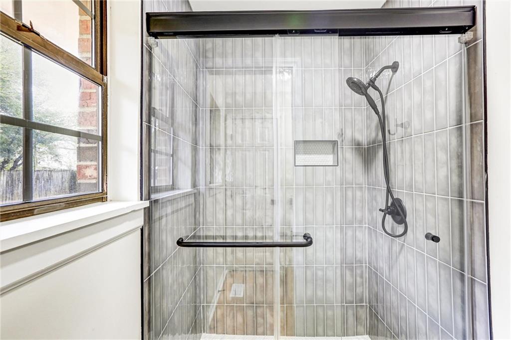 122 Capitol Avenue Winder, GA 30680 - Photo 20 of 34 a bathroom with a shower