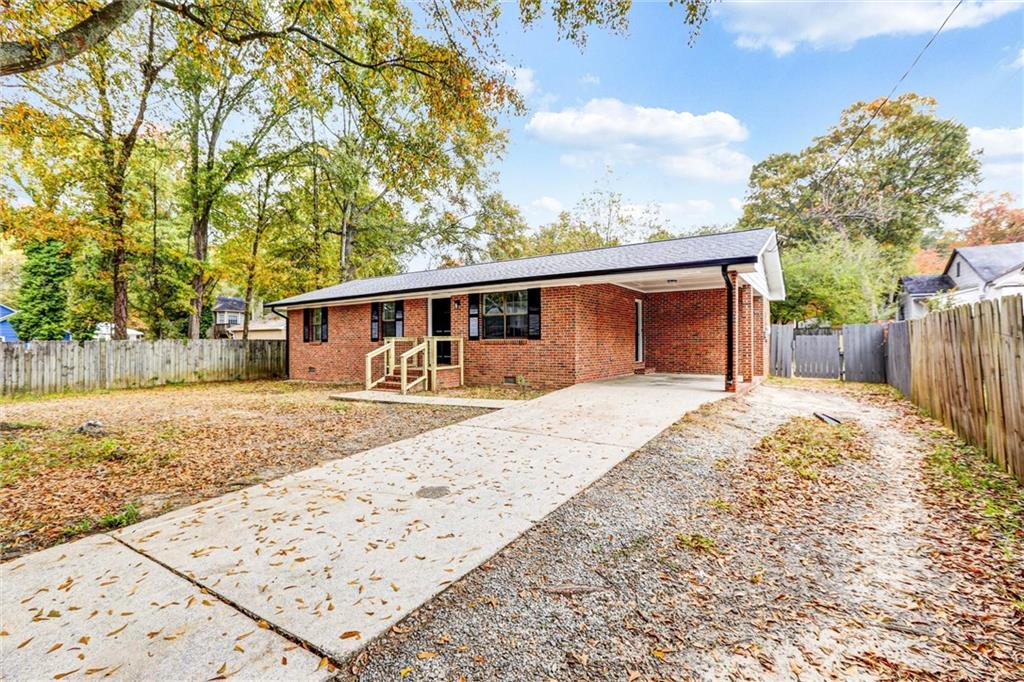 122 Capitol Avenue Winder, GA 30680 - Photo 2 of 34 front view of a house with a yard