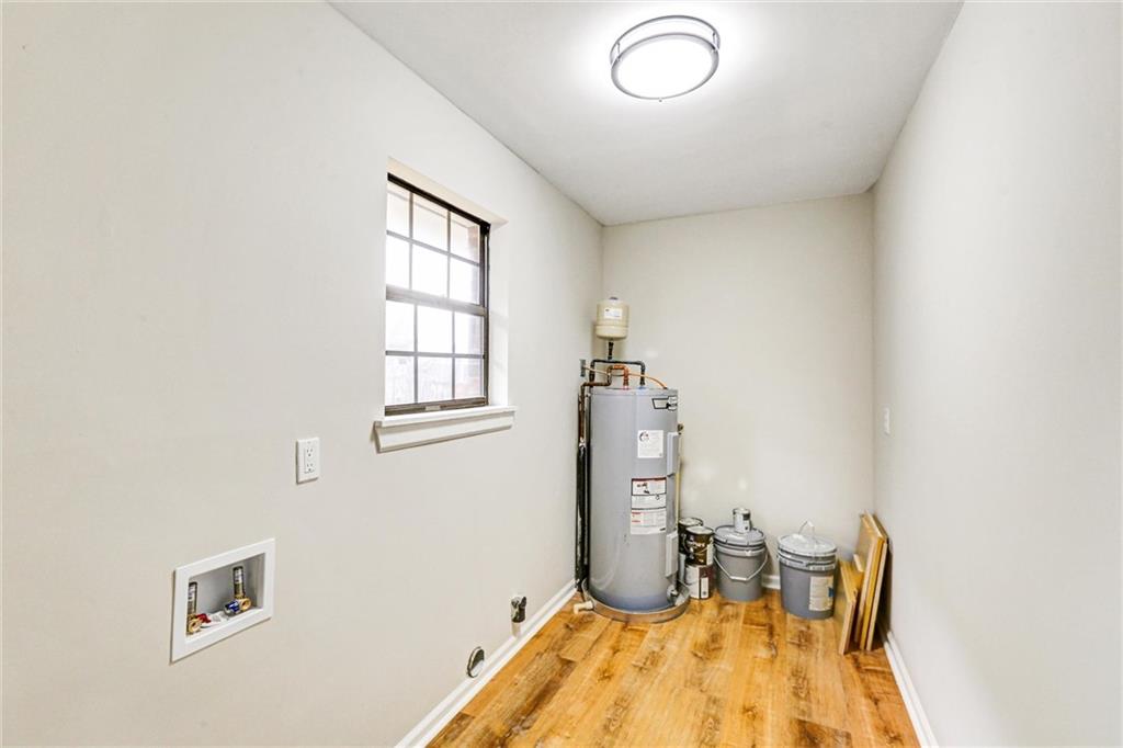 122 Capitol Avenue Winder, GA 30680 - Photo 29 of 34 a dining room with furniture and a window