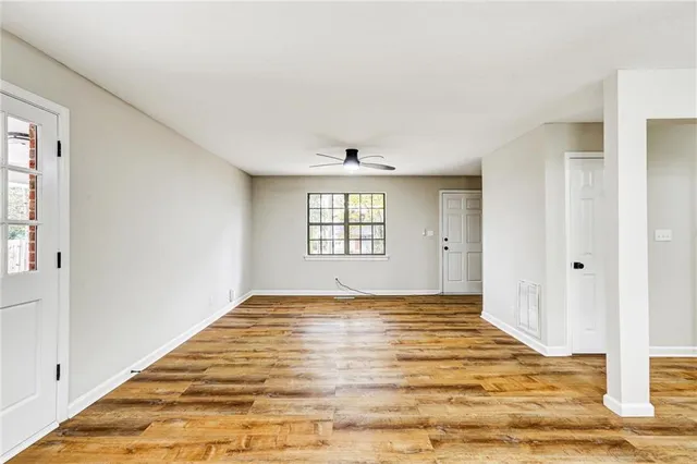 a view of an empty room and window