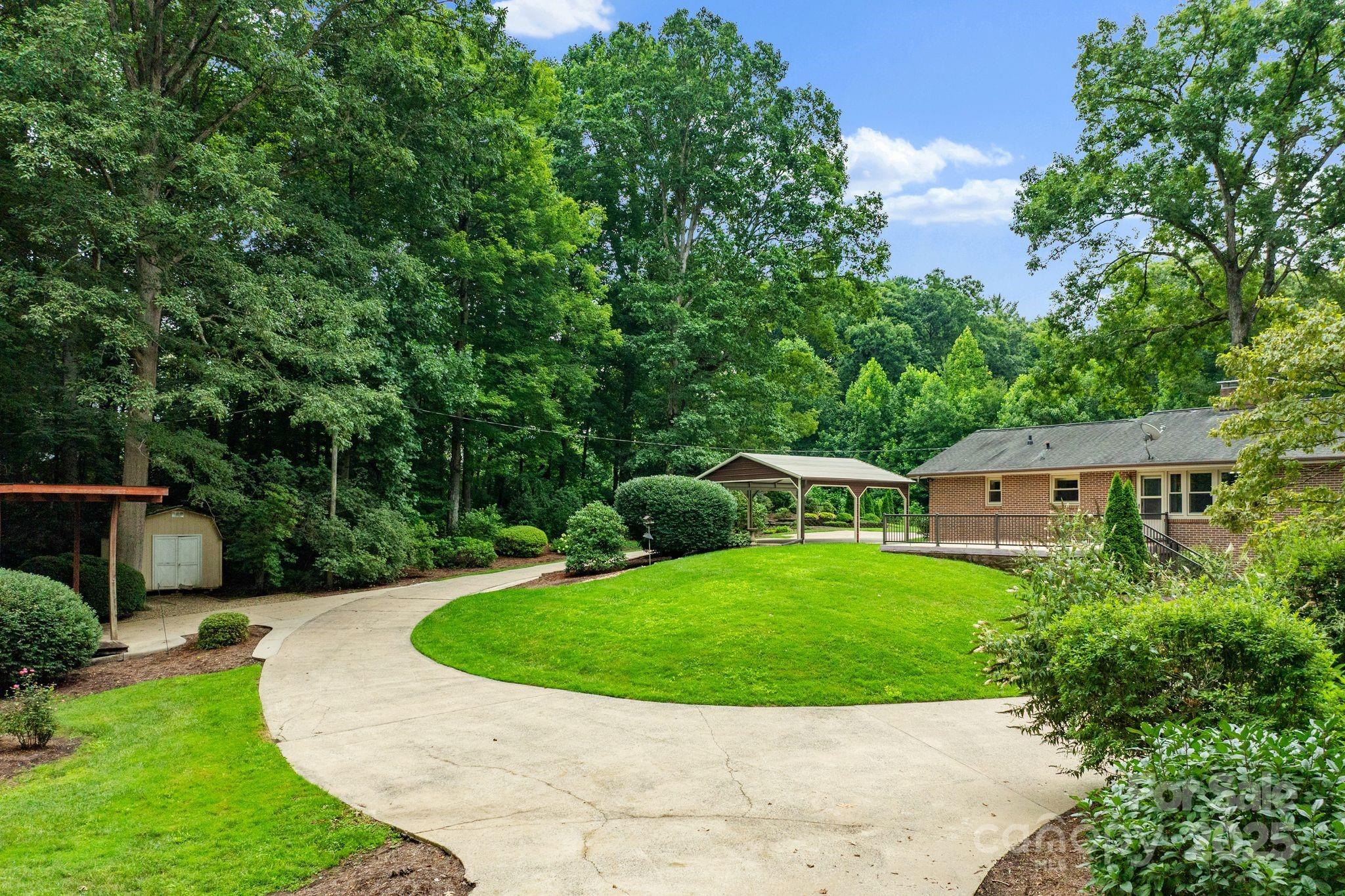6693 Brevard Road Etowah, NC 28729 - Photo 6 of 42 an aerial view of a house
