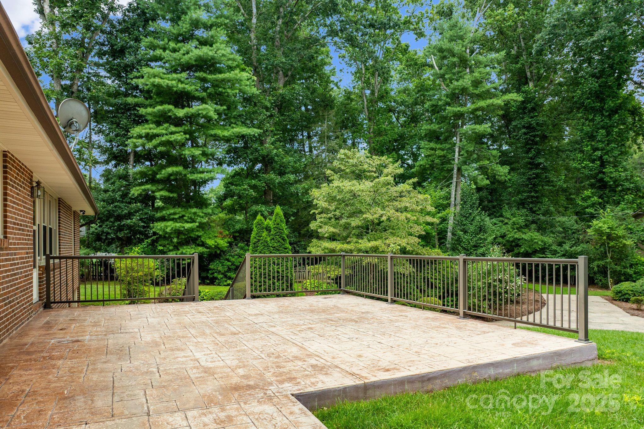 6693 Brevard Road Etowah, NC 28729 - Photo 9 of 42 a view of a backyard