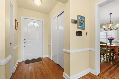 a view of kitchen with furniture and wooden floor