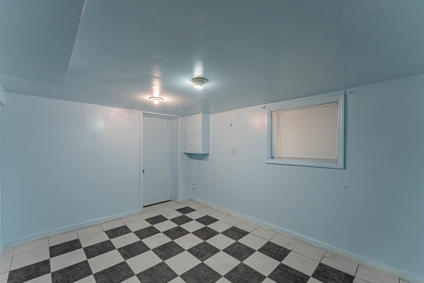 2541 North Mont Clare Avenue Chicago, IL 60707 - Photo 23 of 31 a view of a closet area with wooden floor